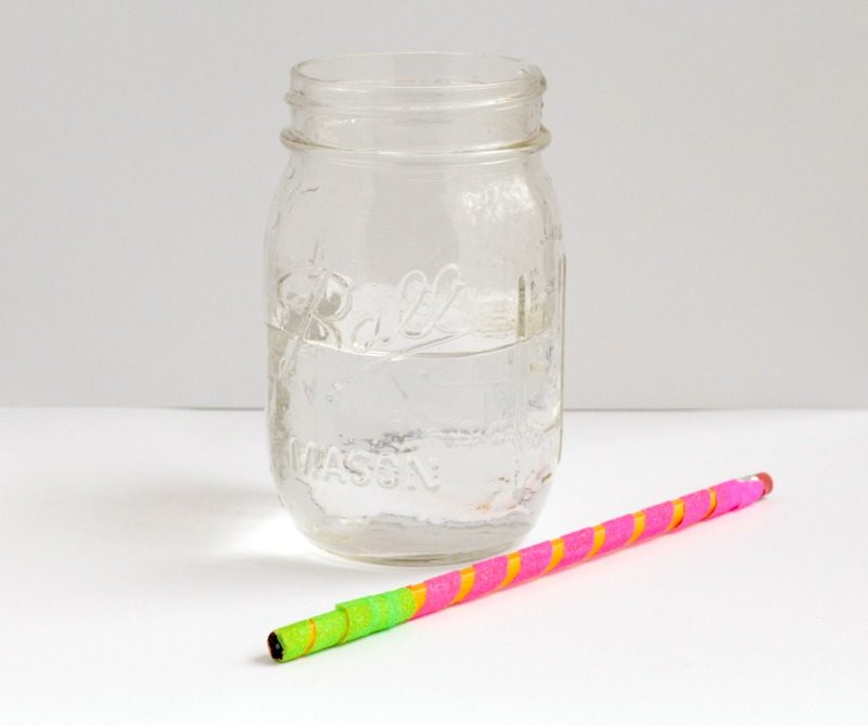 Use this simple bending a pencil science experiment to learn about the basics of light refraction. It's so easy, and teaches a valuable lesson in seconds!