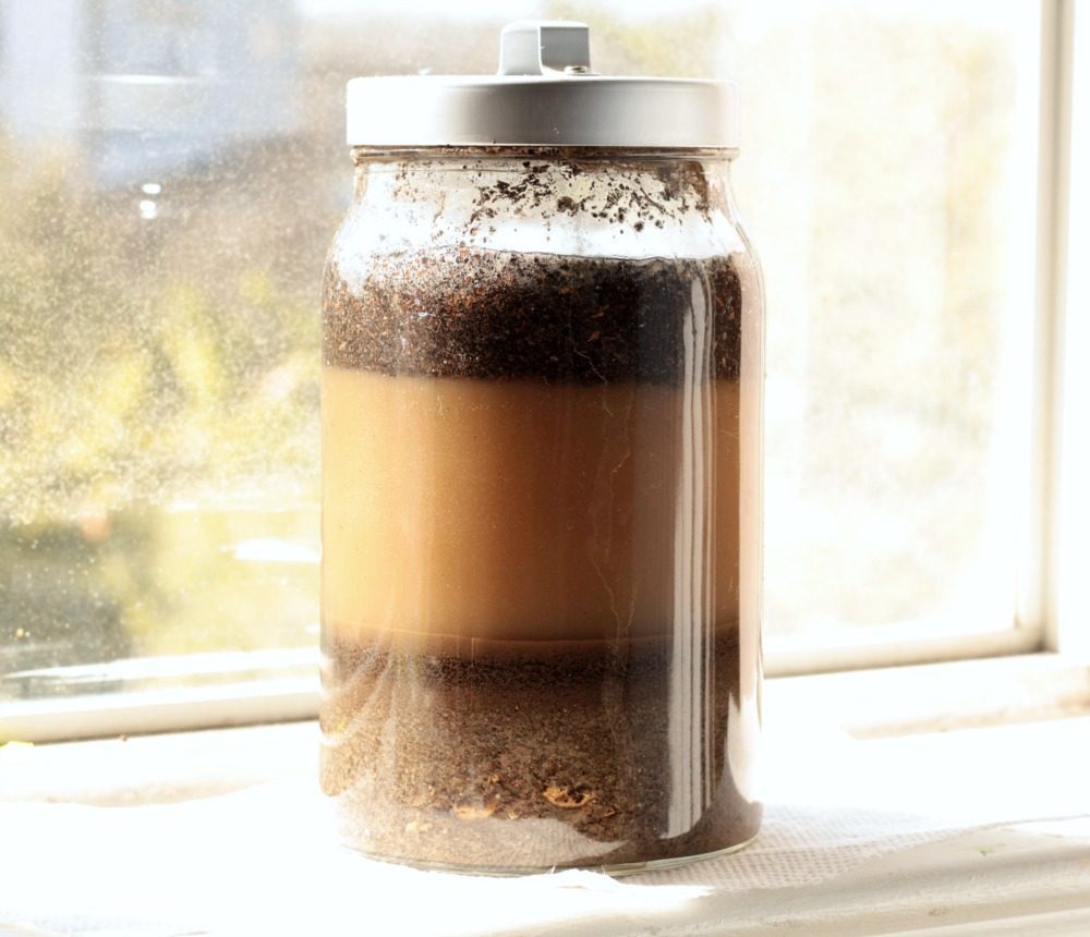 soil layers in a jar