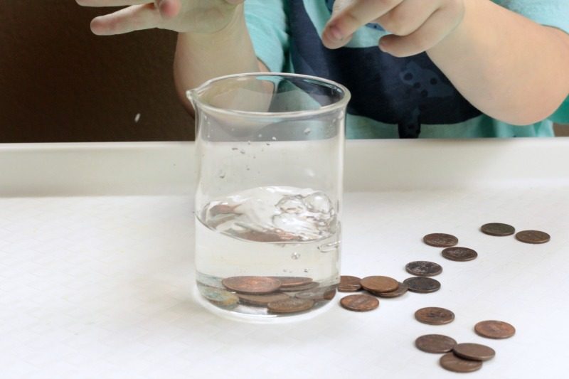 Try your hand at classic science with the cleaning pennies science experiment. Kids will be amazed at how this simple chemical reaction transforms pennies!