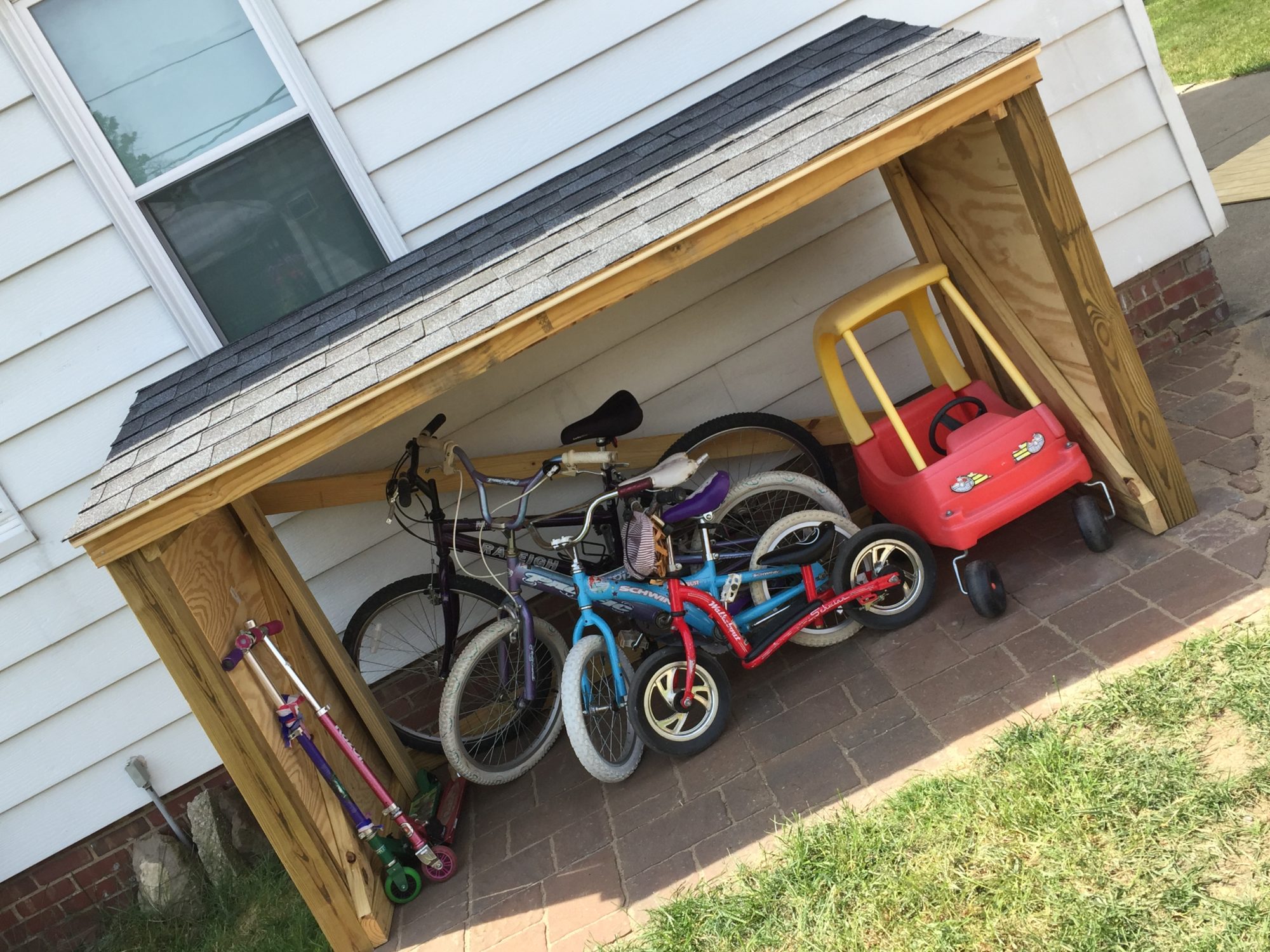 Roofing a Backyard Toy and Bike Shed