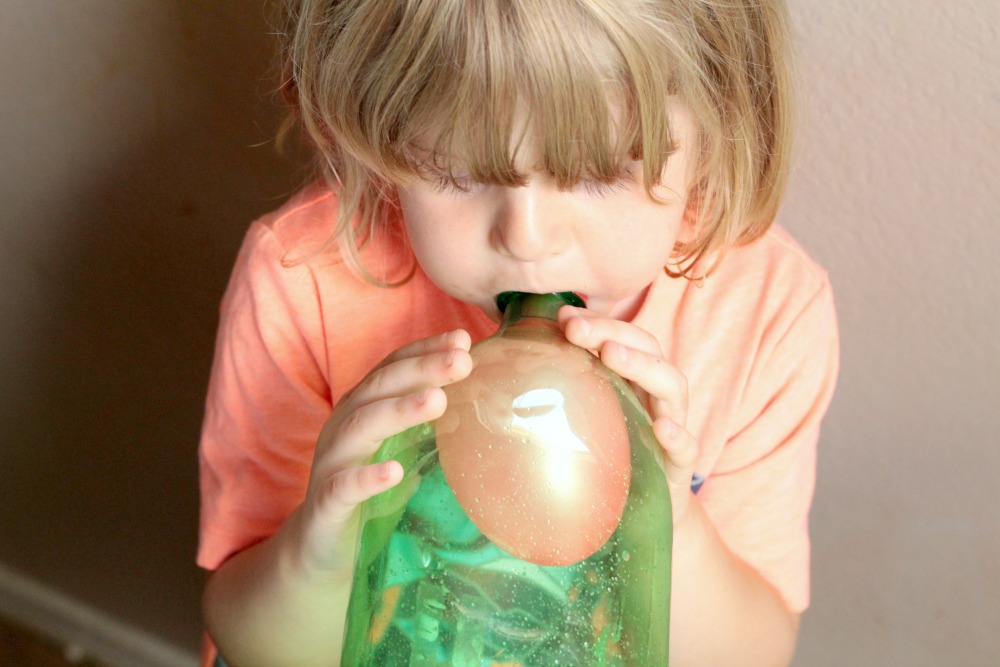 If your kids love science and magic, they will love the blow up a balloon in a bottle science experiment. Is it a trick or science that makes it work?