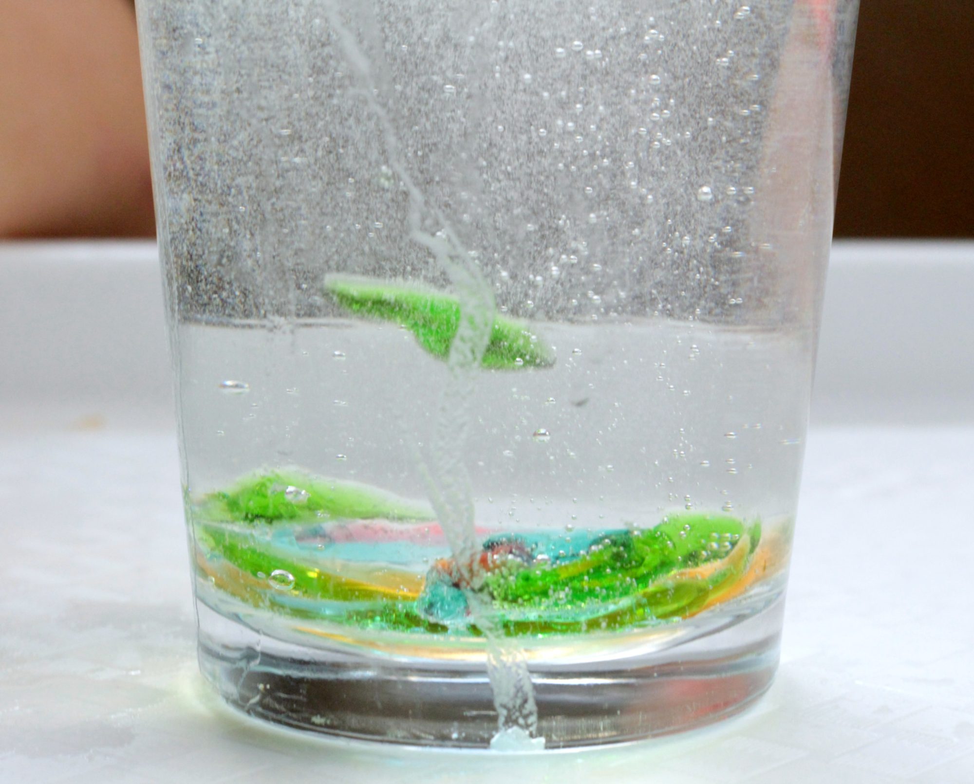 Kids will love this delightfully creepy wiggling snakes science experiment. Learn about the reaction of vinegar and baking soda by making snakes wiggle!