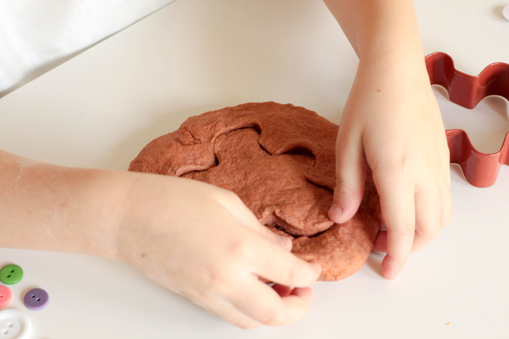 Gingerbread play dough is a fun sensory activity that mixes science and Christmas in a way kids will love! Perfect for Christmas!