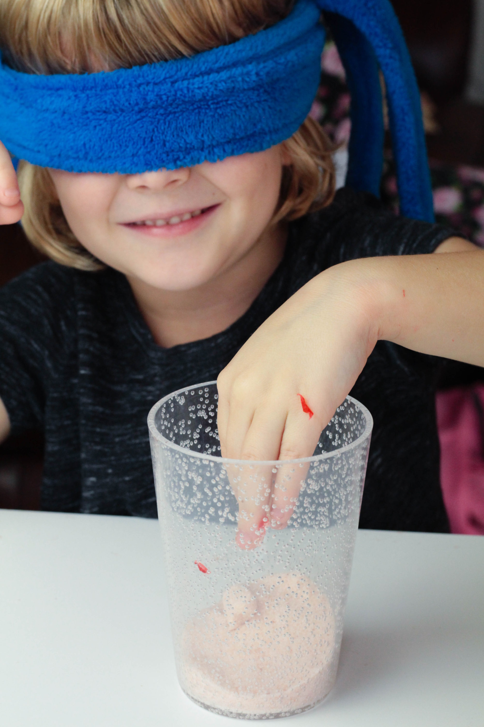 Explore your senses in this sensory blindfold science activity perfect for preschoolers and kindergarten kids. Science has never been so fun!