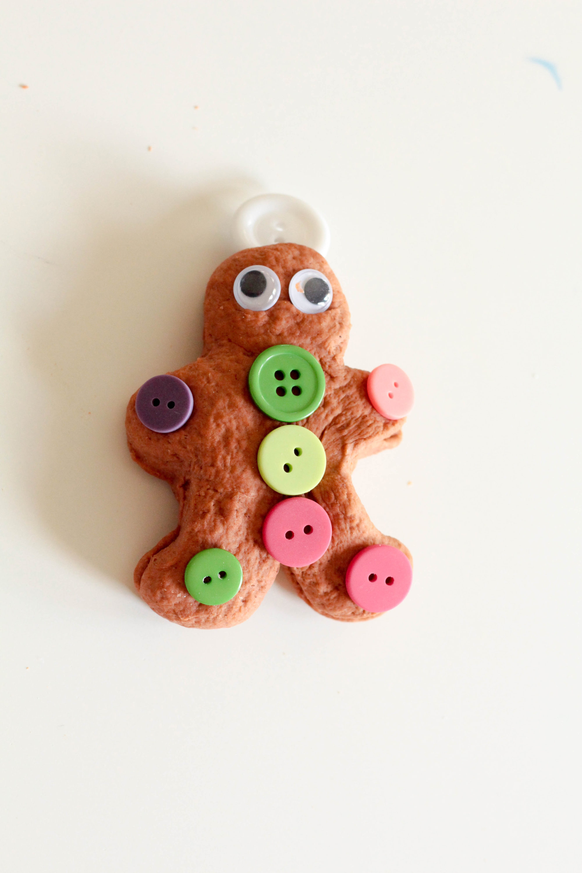 Gingerbread play dough is a fun sensory activity that mixes science and Christmas in a way kids will love! Perfect for Christmas!