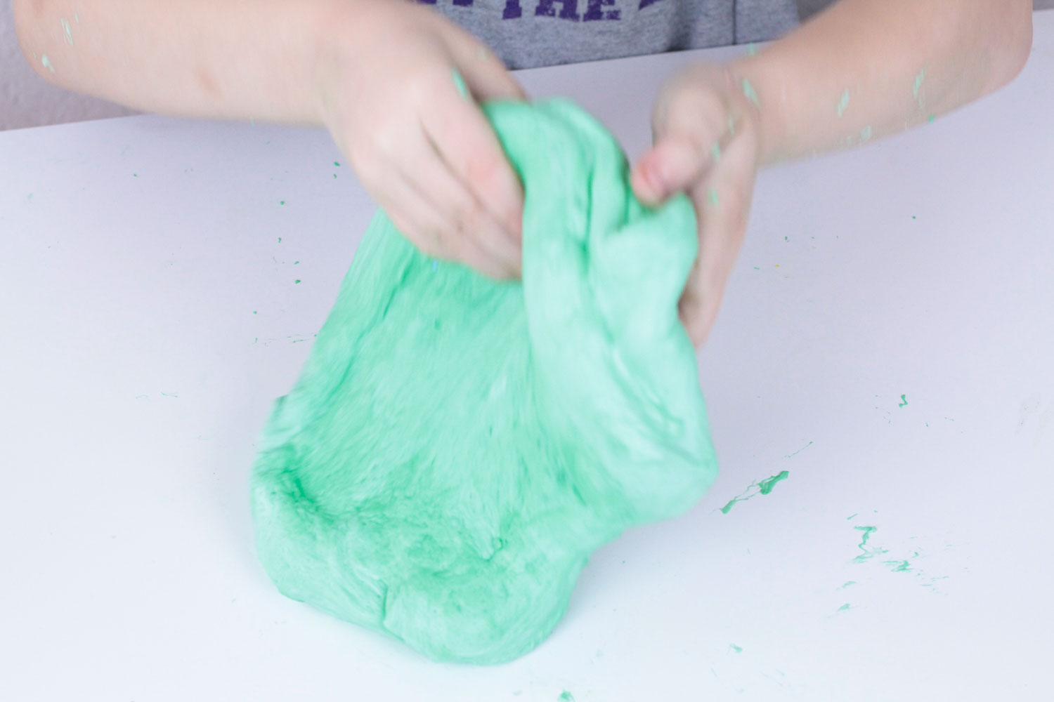 Learn about chemical reactions and polymer chains in this fun activity making perfect fluffy slime! Kids will love this hands-on science activity. 